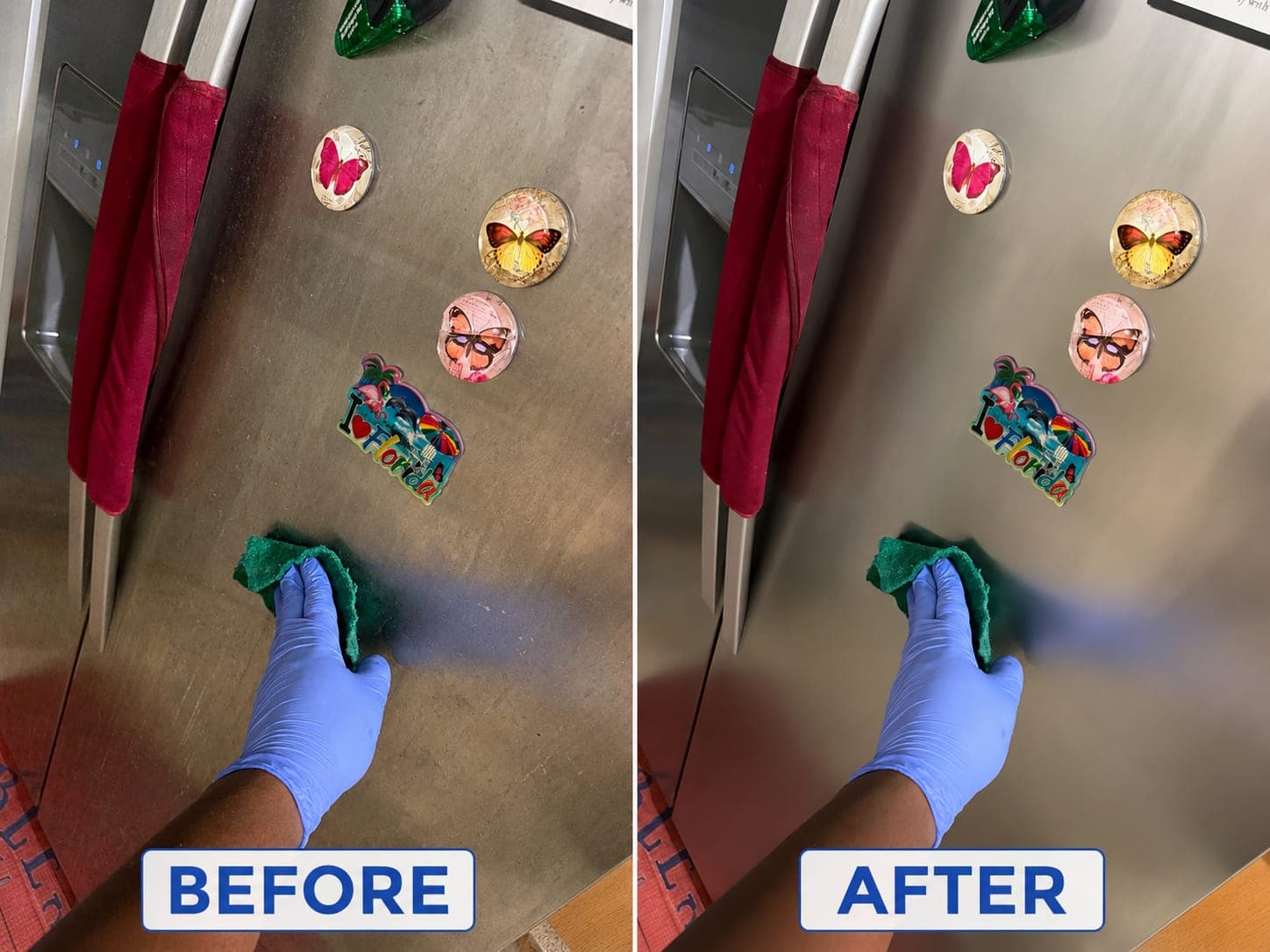 Side-by-side before and after of the same stainless steel fridge door being wiped with a green cloth: hazy with fingerprints and smeared patches on the left, even and clean with the grain visible on the right.